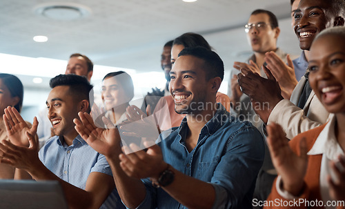 Image of Applause, support and wow with a business team clapping as an audience at a conference or seminar. Meeting, motivation and award with a group of colleagues or employees cheering on an achievement