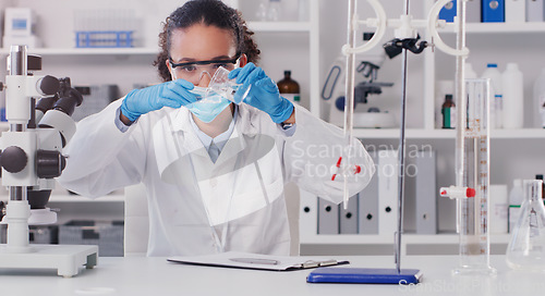 Image of Lab worker, woman scientist and chemical pour of a employee with science work. Laboratory, medical test and chemistry for disease, virus and health analysis doing futuristic research with mask