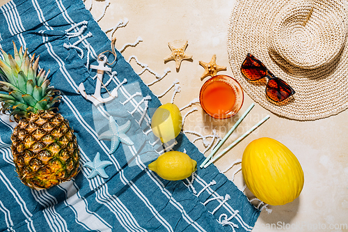 Image of Summer holiday concept, summer accessories with refreshing juice and fresh fruits