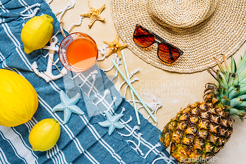 Image of Summer holiday concept, summer accessories with refreshing juice and fresh fruits