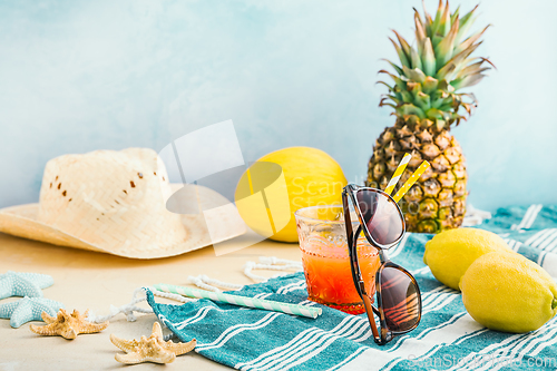 Image of Summer holiday concept, summer accessories with refreshing juice and fresh fruits