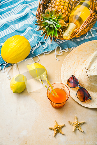 Image of Summer holiday concept, summer accessories with refreshing juice and fresh fruits