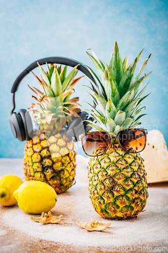 Image of Summer concept - Pineapple hipster in sunglasses with summer fruits, creative art fashionable vacation concept