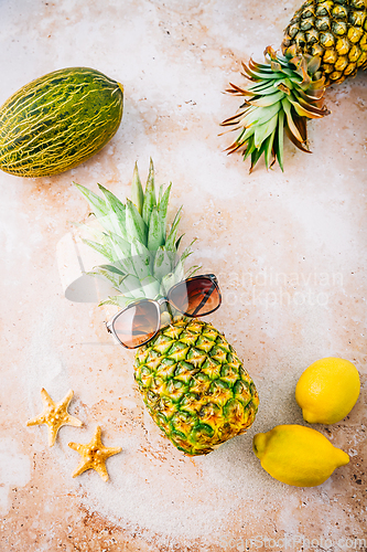 Image of Summer concept - Pineapple hipster in sunglasses with summer fruits, creative art fashionable vacation concept