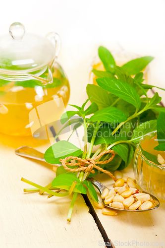 Image of Arab traditional mint and pine nuts tea