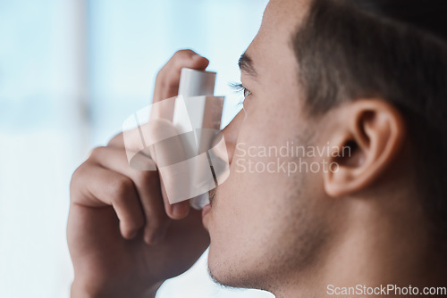 Image of Asthma pump, breathe and man with healthcare, medicine and wellness spray for health. Breathing, inhaler and lung relief with a male person holding medication for medical problem support and care