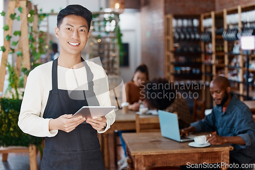 Image of Restaurant, tablet and portrait of man or small business owner, e commerce and cafe or coffee shop management. Happy waiter or Asian person with sales on digital technology or internet for startup