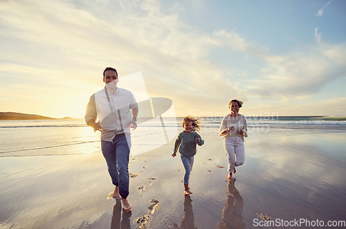 Image of Mother, father and girl on beach at sunset for family holiday, summer vacation and weekend. Nature, travel and happy mom, dad and child running in ocean waves for bonding, playing and quality time