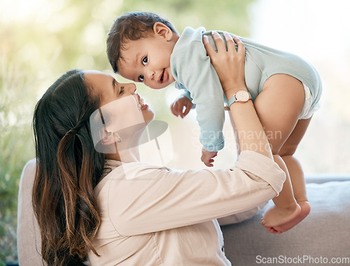 Image of Portrait, airplane and mother with baby on a sofa for games, playing and laughing in their home together. Love, smile and mom with girl toddler on couch, relax and flying, fun and hug in living room