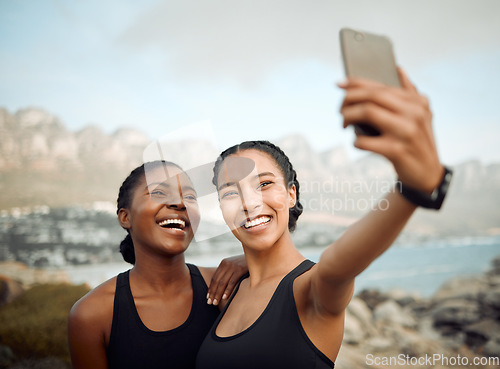 Image of Fitness friends laugh in selfie at beach, women workout together with happiness and active life outdoor. Exercise in nature, healthy and happy with female people training and smile in picture or post