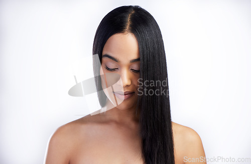 Image of Serious, face and straight hair of woman in studio isolated on a white background for skincare. Growth, haircare and female model in natural makeup, cosmetics and salon treatment for hairstyle mockup