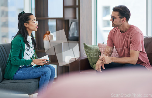 Image of Mental health, psychology or counseling with a woman therapist and male patient talking in her office. Psychologist, therapy and trust with a female doctor or shrink consulting a man for healing