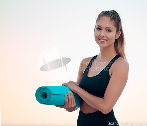 Image of Yoga mat, beach and portrait of woman, smile and outdoor for health, fitness and mockup. Face, pilates and happy female athlete from Canada ready to start exercise, workout or train at summer sunset.