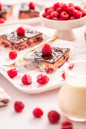 Image of Traditional buttermilk sheet cake with raspberries and  chocolate ganache