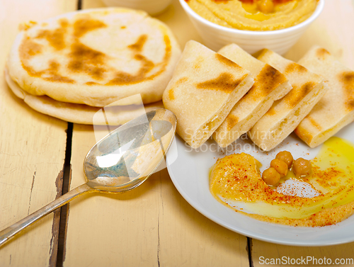 Image of Hummus with pita bread