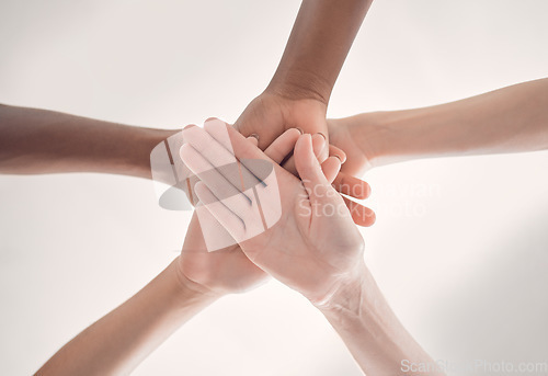 Image of Teamwork, hands and group of people together for support, strategy and collaboration with diversity. Team, trust and hand huddle with cooperation, men and woman in synergy, integration and solidarity