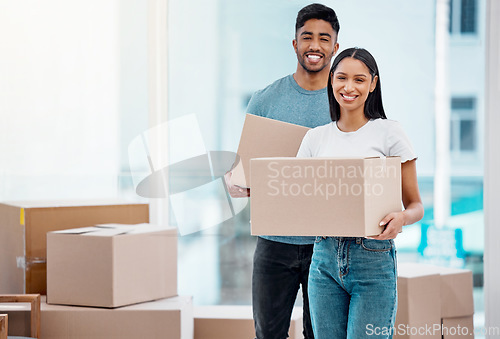 Image of Box, moving and portrait of couple in new home excited for property, apartment and real estate investment. Relationship, mortgage and happy man and woman carry boxes for relocation, move and house