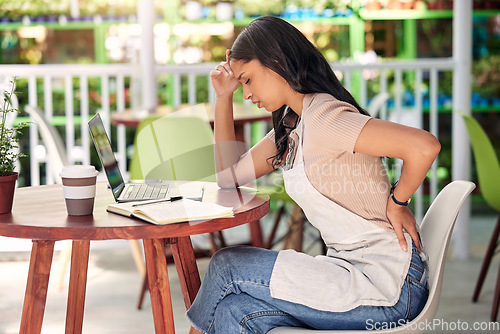 Image of Woman with back pain, laptop in cafe and stress burnout with anxiety and overwhelmed at table. Mental health, sustainable business owner and computer with worry, injury and debt in outdoor restaurant