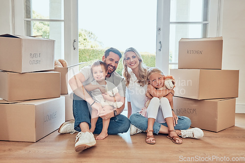 Image of Portrait, parents and kids on floor of new house, real estate and property loan for family home. Happy children, mom and dad moving together for building investment, mortgage and boxes in apartment