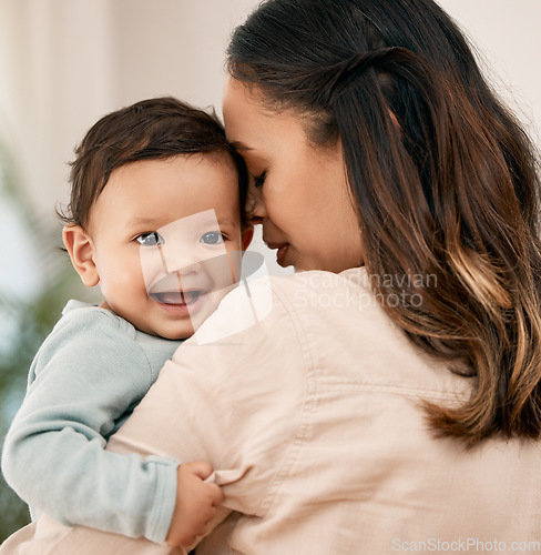 Image of Love, portrait and mother with baby, happy and smile during child development routine in their home together. Family, face and mom with girl toddler in living room having fun, embrace and loving