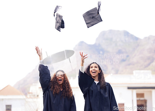 Image of Graduation, hats and students celebrating academic achievement or graduates together with joy on happy day and outdoors. Friends, education and success for degree or excitement and campus picture