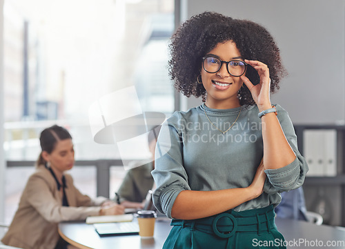 Image of Leadership, portrait and black woman with arms crossed in office for management, empowerment and ambition. Face, leader and African female manager proud, happy and smile with confidence at startup