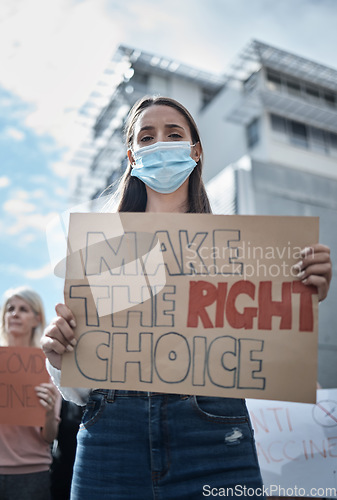 Image of Protest poster, woman face mask and city portrait with fight, human rights support and rally sign. Urban, group and people with a female person holding a pro vaccine movement signage on a street
