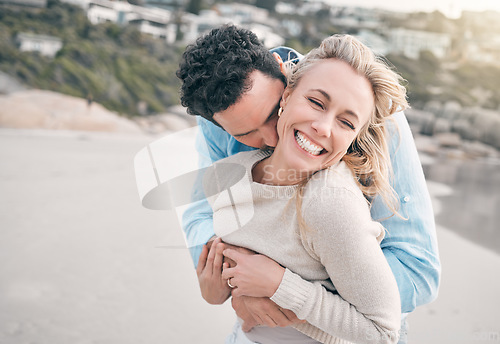 Image of Travel, happy and couple hug on beach for holiday, vacation and weekend for anniversary. Love, marriage and mature man and woman laughing for embrace, bonding and quality time for happiness at ocean