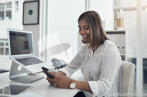 Image of Phone, typing and business woman with happy communication, online news or job networking at her office desk. Planning, working and young person on mobile app, chat or feedback for career opportunity