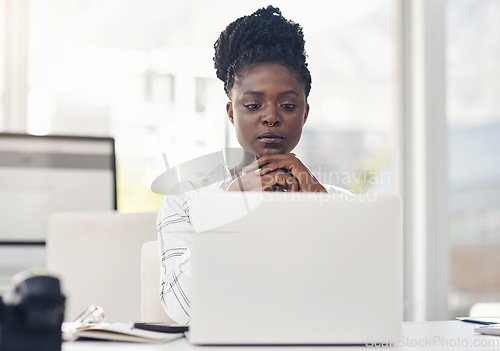 Image of Business, woman and reading on a laptop with internet in africa for entrepreneurship for a company. Professional female, computer and focus for research for working online at a startup or office.