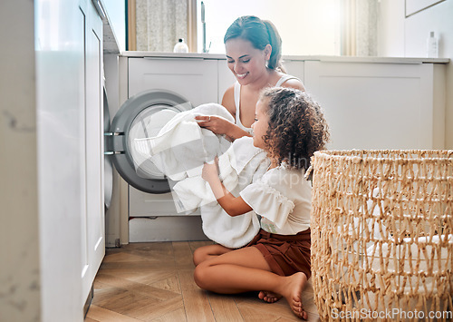 Image of Help, laundry and washing machine with mother and daughter for cleaning, learning and cleaner. Housekeeping, teamwork and basket with woman and young girl in family home for teaching and clothes