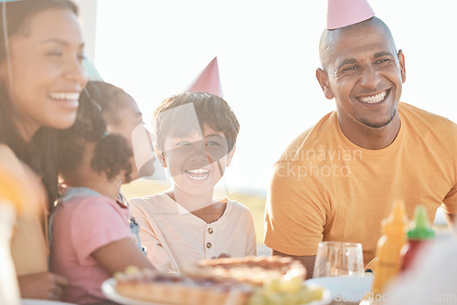 Image of Birthday, park and happy parents with children in park for event, celebration and party outdoors together. Family, social gathering and mother, father with kids at picnic with cake, presents and food