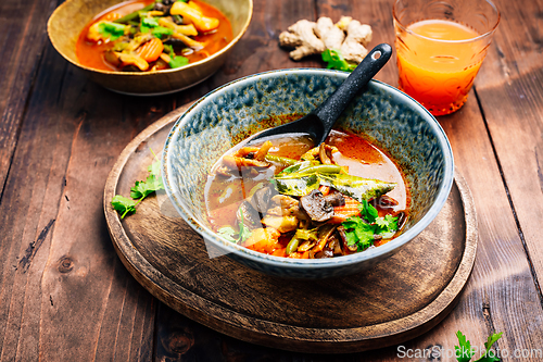 Image of Thai red vegetarian curry with mushrooms and vegetables