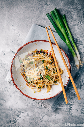 Image of Korean bean sprout salad - spicy mung bean sprouts salad with garlic, sesame seeds, green onions and soy sauce