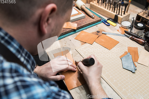 Image of Concept of handmade craft production of leather goods.