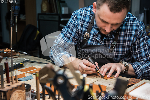 Image of Concept of handmade craft production of leather goods.