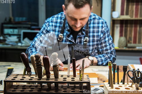 Image of Concept of handmade craft production of leather goods.