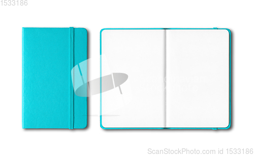 Image of Aqua blue closed and open notebooks isolated on white