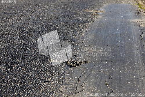 Image of old asphalt road