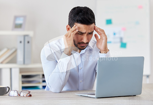Image of Businessman, laptop and headache in stress, depression or mistake and overworked at office. Frustrated and tired asian man by computer with anxiety, debt or bankruptcy in mental health at workplace