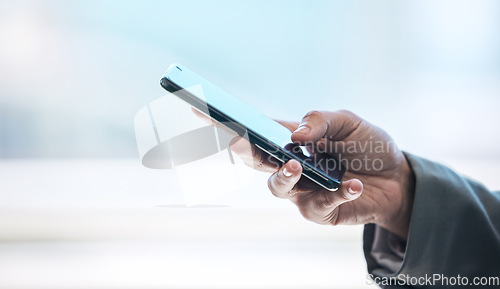 Image of Phone, hand and networking with a business person typing a text message or email on a blurred background. Mobile, contact and communication with an employee browsing social media or texting closeup