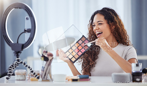 Image of Makeup pallet, influencer and happy woman streaming tutorial for beauty, skin and broadcast for cosmetics. Live stream, filming and content creator, make up artist vlogging with color and skincare.