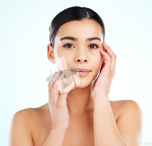 Image of Face, beauty skincare and woman in studio isolated on a white background. Portrait, natural aesthetic and confident female model with cosmetics for spa facial treatment, healthy skin and wellness.