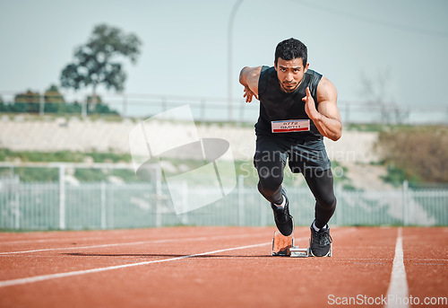 Image of Stadium focus, man running and athlete on a runner and arena track for sprint race training. Fast, run and sports exercise of a male person in marathon for fitness and cardio workout outdoor