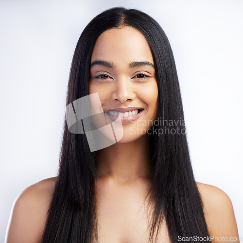 Image of Face, smile and straight hair of woman in studio isolated on a white background for skincare. Portrait, haircare and female model in natural makeup, cosmetics and salon treatment for beauty hairstyle