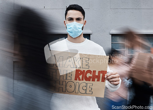 Image of Protest signage, man face mask and portrait with fight, human rights and rally sign in city. Urban, group and protesting people with a male person holding a pro vaccine movement poster on a street