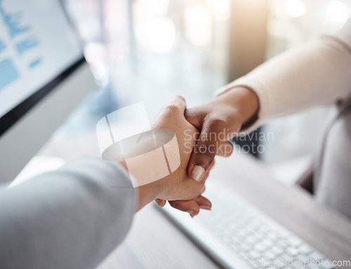 Image of Thank you, businesspeople shaking hands and at desk of a modern workplace office. Partnership or interview, agreement or welcome and coworkers with a handshake for agreement or congratulations