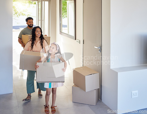 Image of Happy family, real estate and moving in new home with box for property, mortgage loan or relocation. Mother, father and child homeowner carrying boxes together for renovation in apartment or house