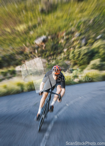 Image of Bicycle, motion blur and man cycling fast in nature, mountain or adventure on trail, forest or valley path. Athlete, fitness and extreme bike sports with freedom, energy and off road exercise