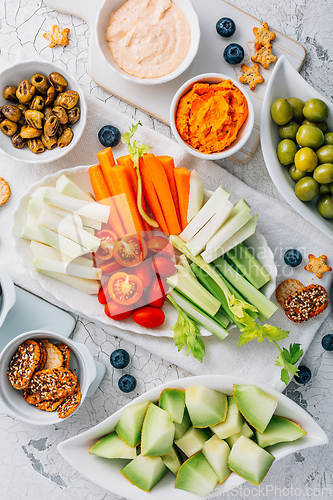 Image of Crudites platter, raw vegetarian food or party vegetarian platter with various veggie snacks and dips